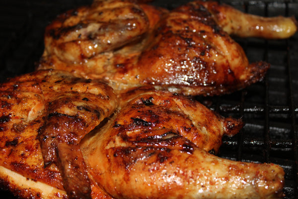 Smoked chicken and grilled. Similar to jerk chicken.